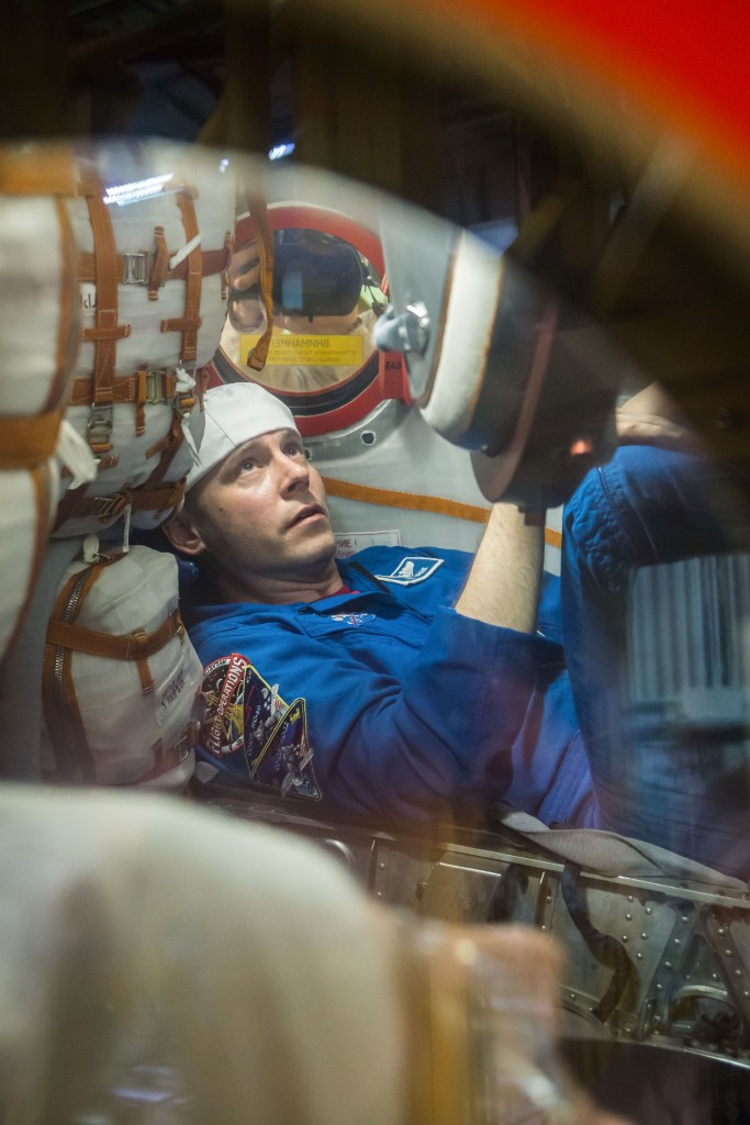 At the Baikonur Cosmodrome in Kazakhstan, Expedition 59 crew member Nick Hague of NASA works inside the Soyuz MS-12 spacecraft Feb. 27 during pre-launch training. Hague, Christina Koch of NASA and Alexey Ovchinin of Roscosmos will launch March 14, U.S. time, on the Soyuz MS-12 spacecraft from the Baikonur Cosmodrome in Kazakhstan for a six-and-a-half month mission on the International Space Station.