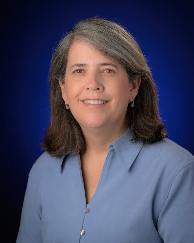 Christine Powell poses for a portrait, Wednesday, November 2, 2022, at the Mary W. Jackson NASA Headquarters in Washington.