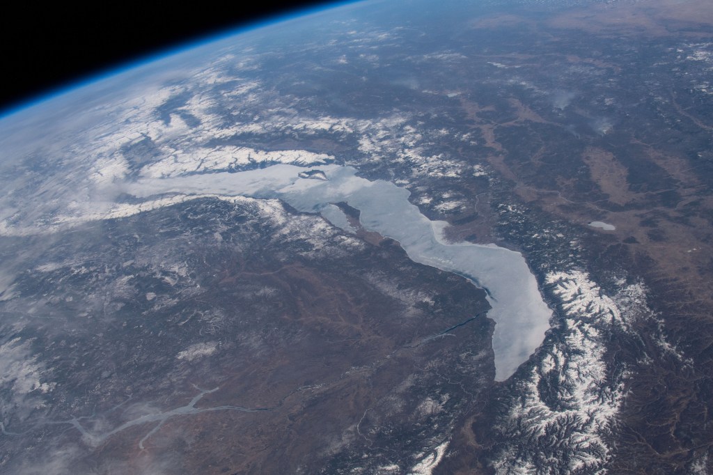 Orbiting 258 miles above Russia and Mongolia, an Expedition 59 crew member aboard the International Space Station photographed Lake Baikal.