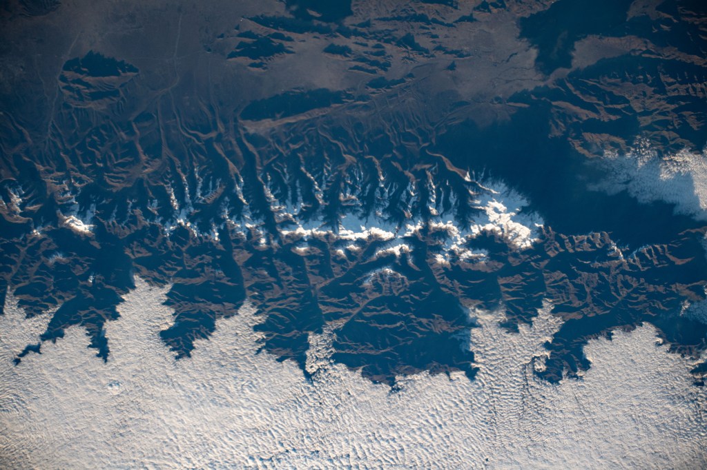 Snow-capped mountain tops are pictured as the International Space Station orbited 257 miles above the Andes mountain range along the western coast of South America.