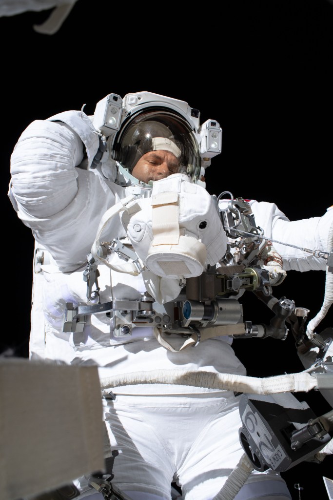 Expedition 59 Flight Engineer David Saint-Jacques of the Canadian Space Agency participates in a six-and-a-half hour spacewalk with NASA astronaut Anne McClain (out of frame). The spacewalkers successfully established a redundant path of power to the Canadian-built robotic arm, known as Canadarm2, and installed cables to provide for more expansive wireless communications coverage outside the orbital complex, as well as for enhanced hardwired computer network capability. The duo also relocated an adapter plate from the first spacewalk in preparation for future battery upgrade operations.