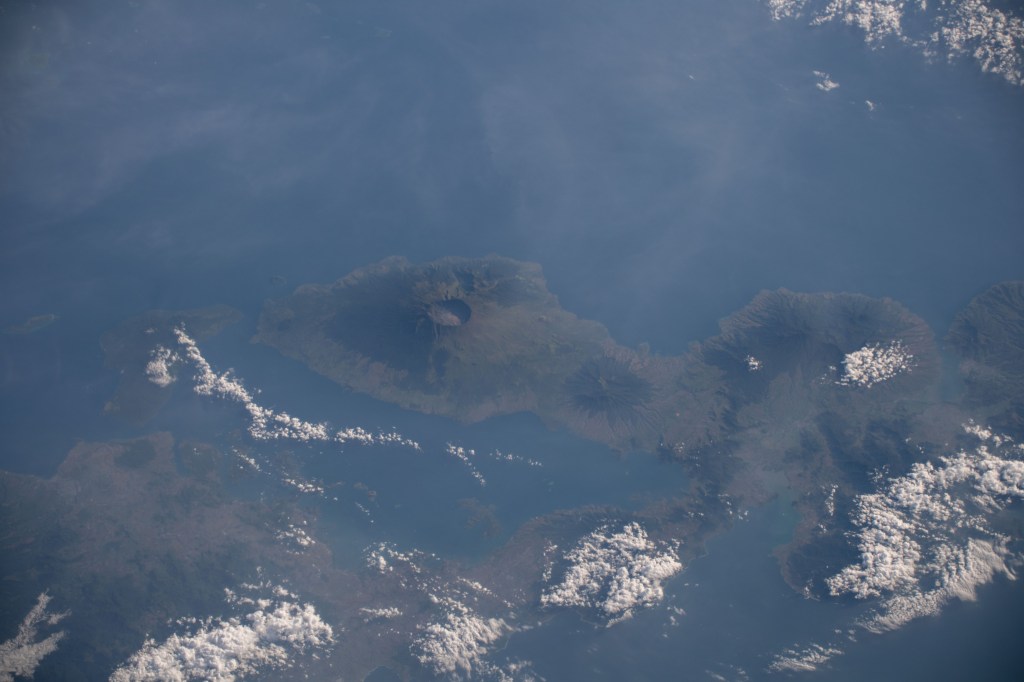 The active volcano of Mount Tambora on the Indonesian province island of West Nusa Tenggara is pictured as the International Space Station orbited 256 miles above the southeast Asian nation.