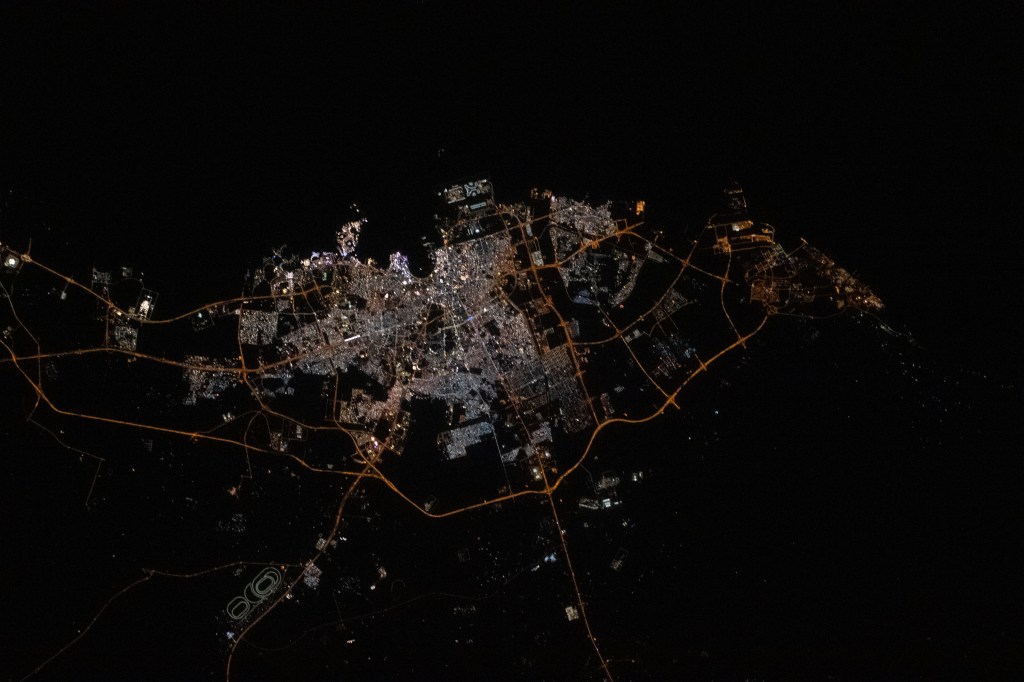 iss068e026585 (Dec. 4, 2022) --- The city lights of Doha, Qatar, are pictured on the coast of the Persian Gulf as the International Space Station orbited 258 miles above.