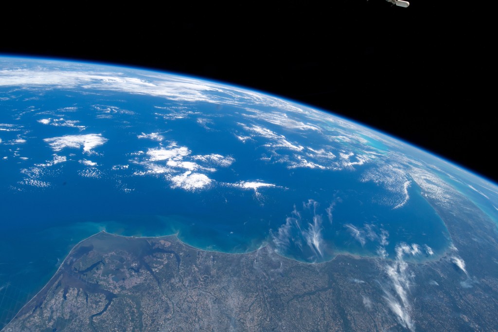 This view of the eastern coast of the United States looks from (bottom left to right center) Virginia Beach, Virginia, all the way to Miami, Florida. The International Space Station was orbiting 256 miles above North America about to cross the Atlantic Ocean when an Expedition 59 crew member took this photograph.