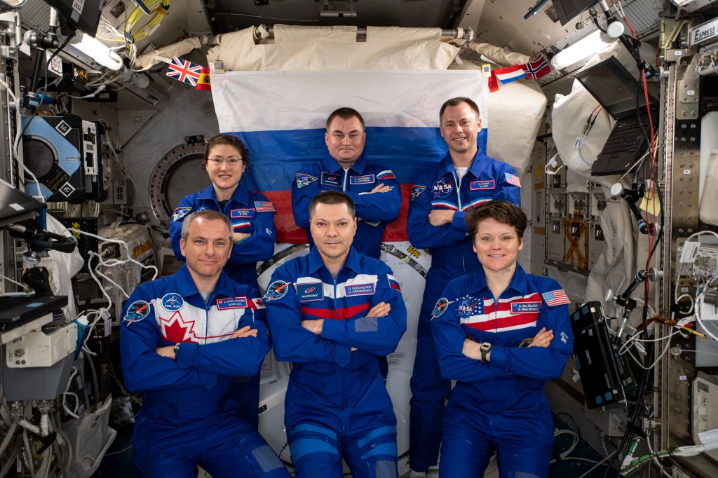 The Expedition 59 crewmembers gather for a portrait inside Japan's Kibo laboratory module. Front row from left are David Saint-Jacques, Oleg Kononenko and Anne McClain who are returning to Earth June 24. In the back are Christina Koch, Alexey Ovchinin and Nick Hague.