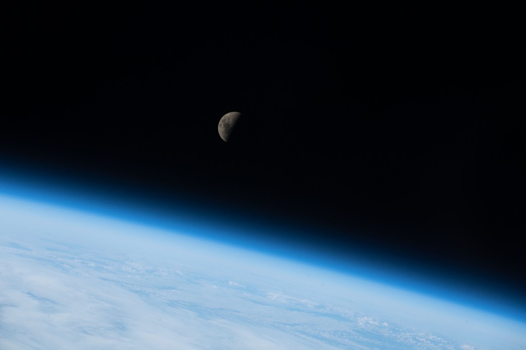 iss068e007201 (Oct. 2, 2022) --- The First Quarter Moon is pictured above the Earth's horizon as the International Space Station orbited 268 miles above the Indian Ocean south of Australia.