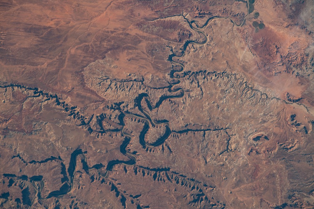 iss068e015304 (Oct. 11, 2022) --- The Green River snakes through Canyonlands National Park near Moab, Utah, in this photograph from the International Space Station as it orbited 262 miles above the Beehive State. Credit: NASA/Kjell Lindgren