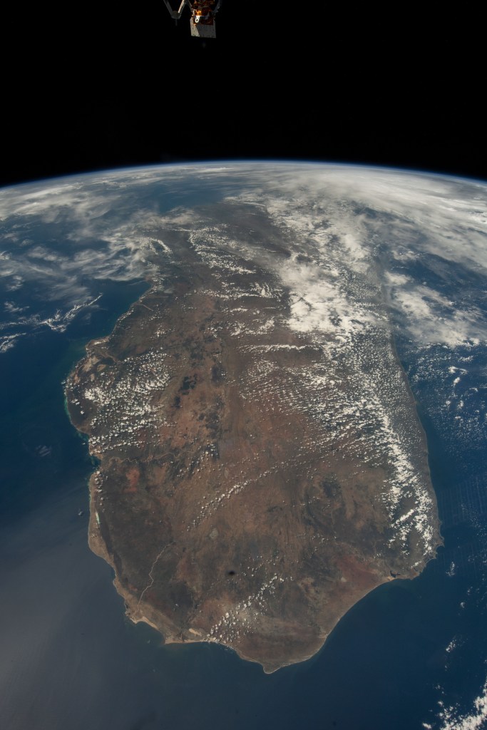 iss068e040605 (Jan. 18, 2023) --- The island nation of Madagascar, looking north toward Earth's horizon, is pictured from the International Space Station as it orbited 262 miles above the Indian Ocean.