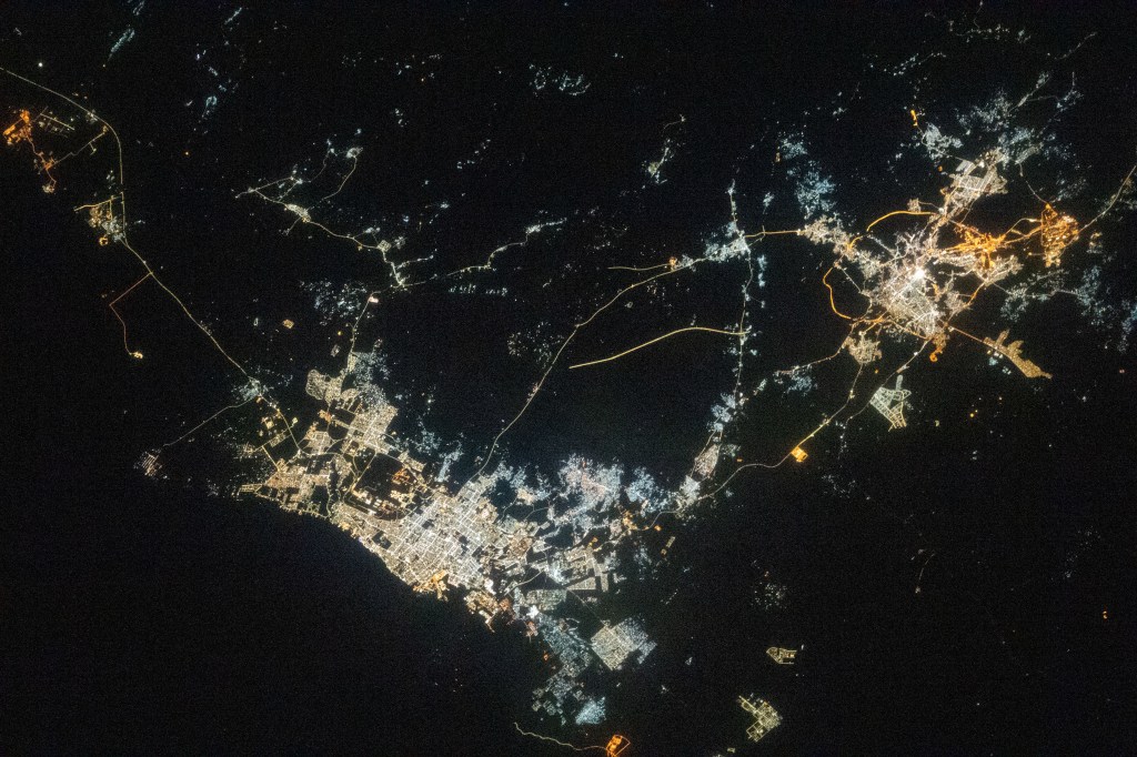 iss068e076629 (March 26, 2023) --- The night lights of the Saudi Arabian cities of Jeddah (lower left) and Mecca (upper right) contrast with the darkness of the Red Sea and the surrounding desert in this photograph from International Space Station as it orbited 258 miles above.