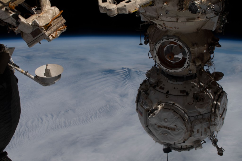 iss068e039258 (Jan. 8, 2023) --- The Prichal docking module is attached to the Nauka multipurpose laboratory module, both recent additions to the International Space Station from Roscosmos, in this photograph from the orbiting lab as it soared 266 miles above a cloudy southern Indian Ocean.