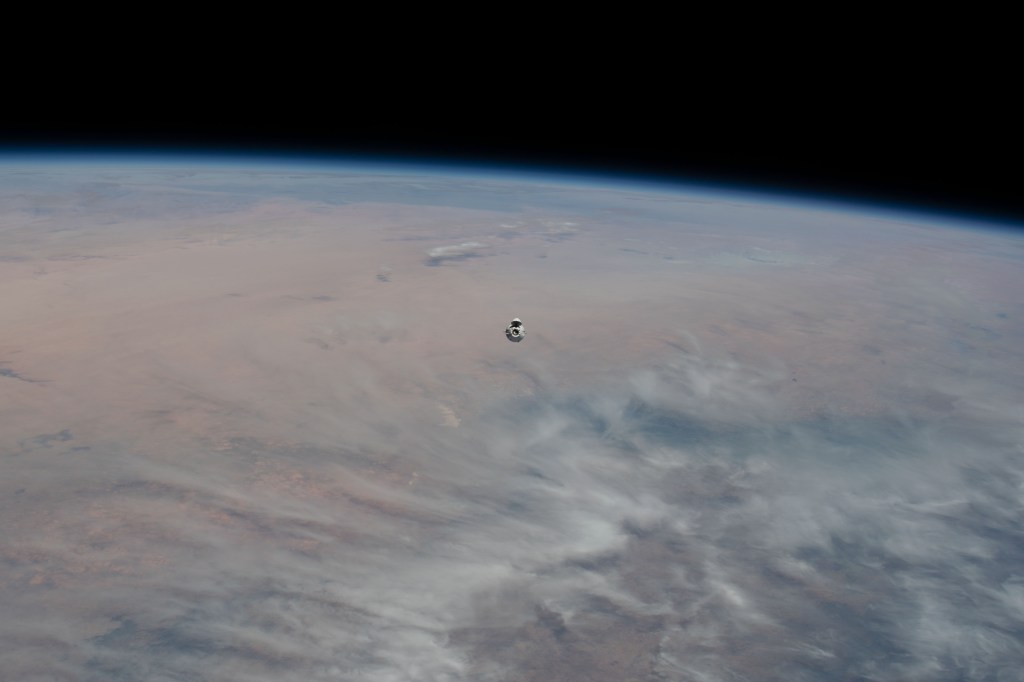 iss068e025148 (Nov. 27, 2022) --- Flying 268 miles over southern Nigeria, the SpaceX Dragon cargo craft, loaded with over 7,700 pounds of science, supplies, and cargo, approaches the International Space Station.