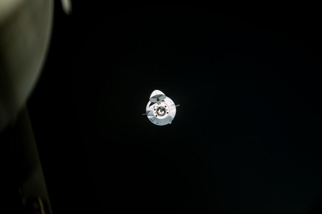 iss068e025336 (Nov. 27, 2022) --- The SpaceX Dragon cargo craft, loaded with over 7,700 pounds of science, supplies, and cargo, approaches the International Space Station for a docking.