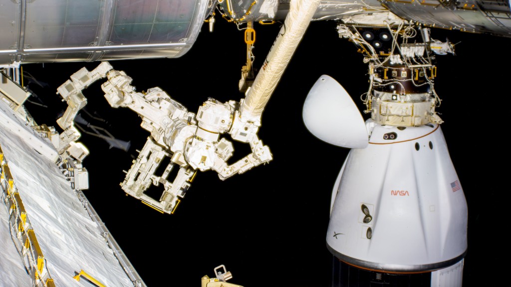 iss068e035568 (Dec. 29, 2022) --- The SpaceX Dragon cargo craft is pictured docked to the International Space Station's space-facing port on the Harmony module. In the foreground, is the Dextre fine-tuned robotic hand attached to the Canadarm2 robotic arm.