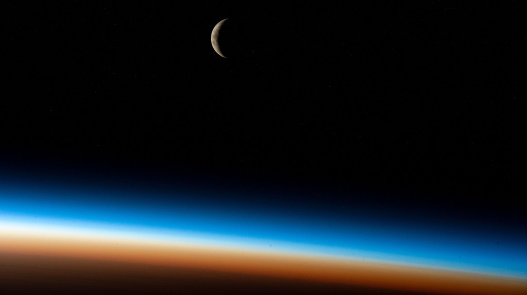 iss068e004256 (Sept. 30, 2022) --- The waxing crescent Moon is pictured from the International Space Station as it orbited 267 miles above the Atlantic Ocean southwest of South Africa during an orbital sunrise.