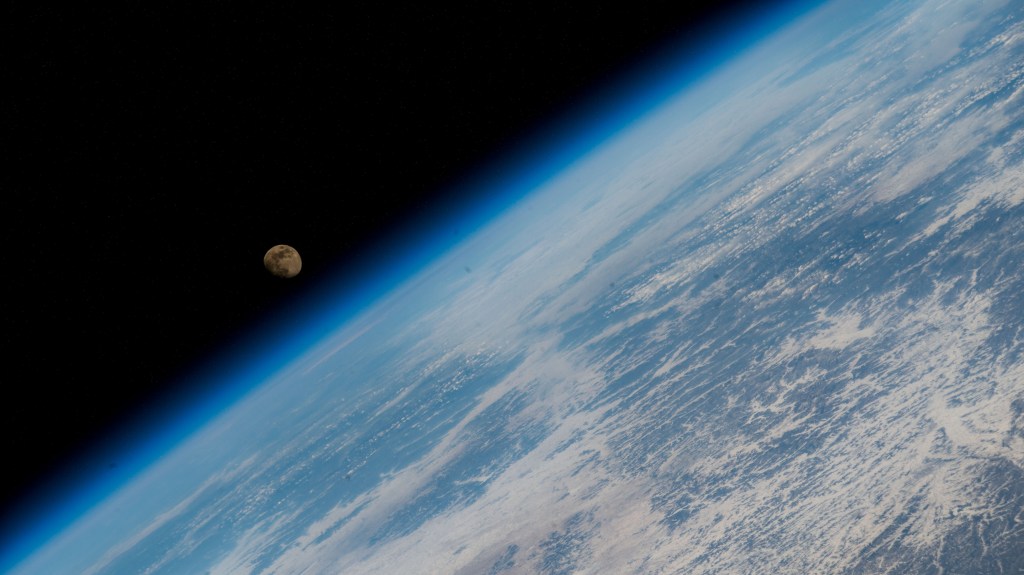 iss068e045017 (Feb. 2, 2023) -- The waxing gibbous Moon is pictured above Earth's horizon from the International Space Station as it orbited 260 miles above eastern China near the Yellow Sea coast.