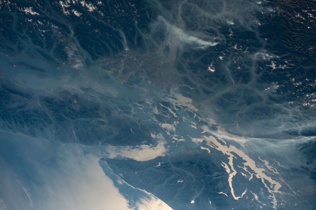 iss068e011266 (Oct. 1, 2022) --- Vancouver in British Columbia, Canada (at top), and Seattle, Washington (lower right) are pictured from the International Space Station as it orbited 262 miles above North America. Credit: NASA/Bob Hines