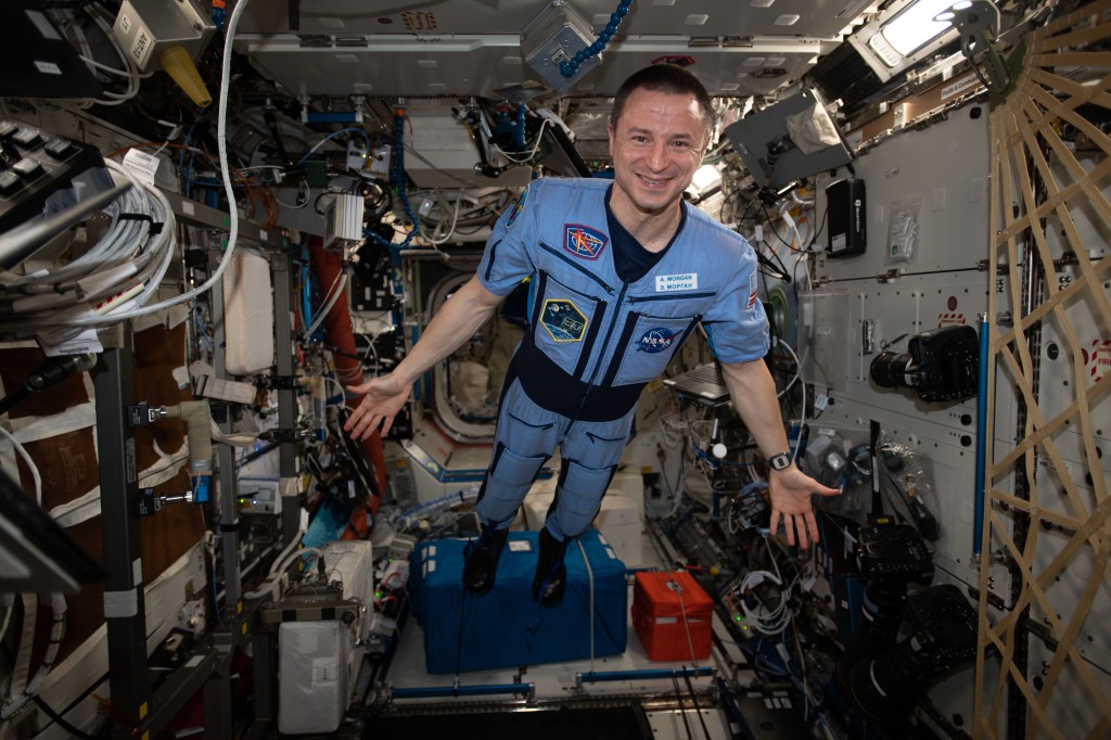 iss062e115993 (March 29, 2020) --- NASA astronaut and Expedition 62 Flight Engineer Andrew Morgan poses for a portrait in the weightless environment of the International Space Station.