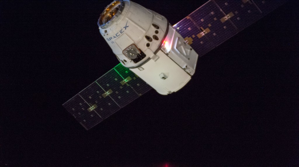 The SpaceX Dragon cargo craft slowly approaches the International Space Station. Astronauts Alexander Gerst and Serena Auñón-Chancellor were monitoring Dragon from inside the cupola and preparing to slowly reach out and grapple the cargo craft with the Canadarm2 robotic arm. Dragon, packed with over 5,600 pounds of cargo, completed a three-day trip to the International Space Station that began with a launch from Cape Canaveral Air Force Station in Florida and ended with its installation and hatch opening on the Harmony module.