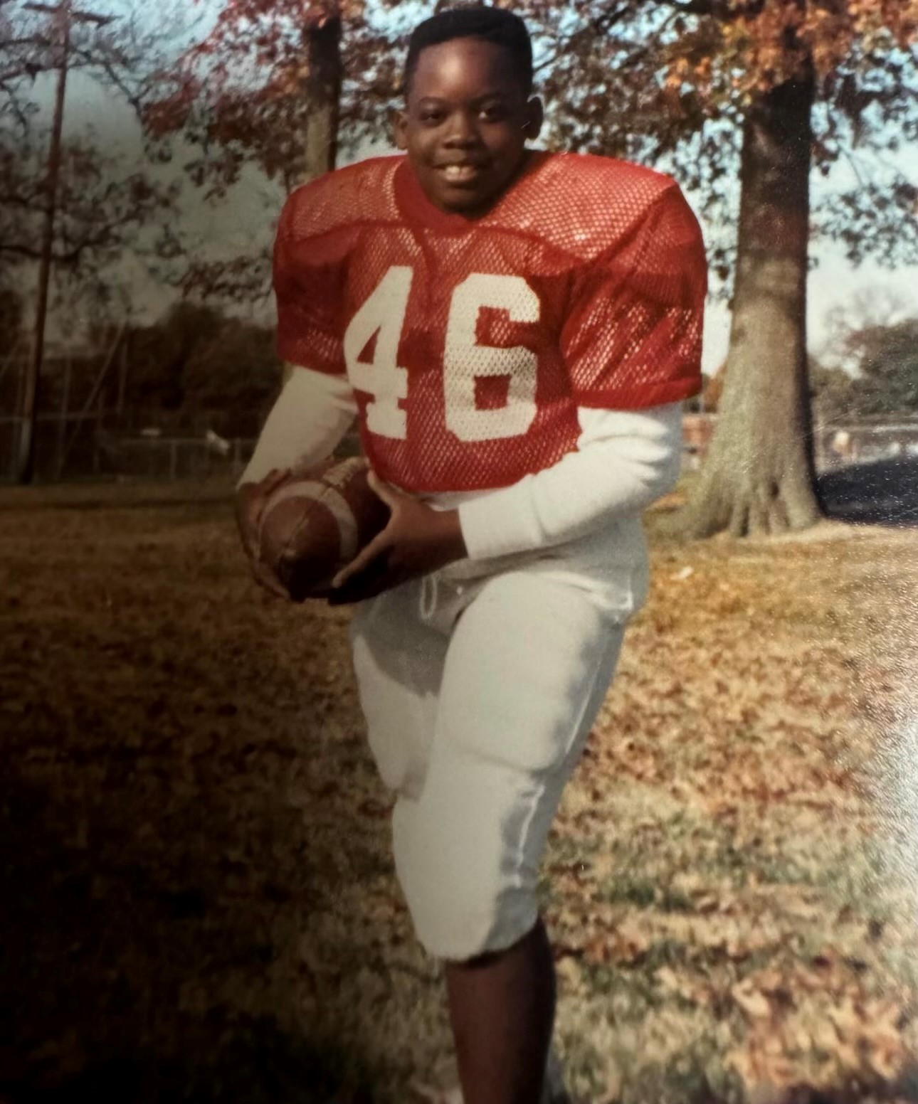 Corey Twine as a young child in a football uniform.  