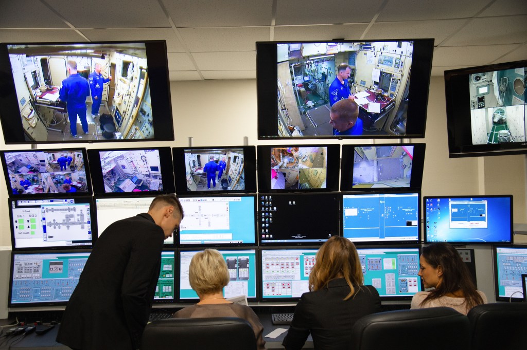 At the Gagarin Cosmonaut Training Center in Star City, Russia, mission trainers monitor the activities of Expedition 57 crew members Alexey Ovchinin of Roscosmos and Nick Hague of NASA during the first day of their Soyuz qualification exams Sept. 13. Ovchinin and Hague are scheduled to launch Oct. 11 from the Baikonur Cosmodrome in Kazakhstan on the Soyuz MS-10 spacecraft for a six month mission on the International Space Station.