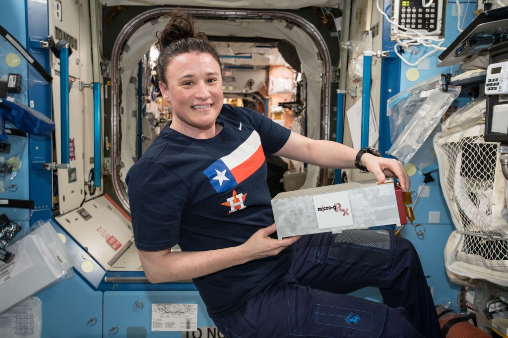 A view of NASA astronaut Serena Auñón-Chancellor holding the Microg-Rx CubeLab. The Culturing of Human Myocytes in Microgravity: An In Vitro Model to Evaluate Therapeutics to Counteract Muscle Wasting (Culturing of Human Myocytes in Microgravity) experiment aims to better understand muscle growth and repair in microgravity. Muscle wasting occurs in people on Earth with cancer, HIV/AIDS, heart failure, rheumatoid arthritis, chronic obstructive pulmonary disease, and sarcopenia (age-related muscle loss). This investigation may support development of countermeasures and treatments for muscle wasting from these conditions.