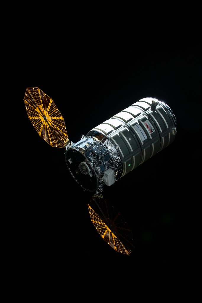 Northrop Grumman's Cygnus space freighter with its prominent cymbal-shaped UltraFlex solar arrays slowly approaches the International Space Station before it's capture with the Canadarm2 robotic arm operated by Expedition 57 Flight Engineer Serena Auñón-Chancellor and ESA (European Space Agency) astronaut Alexander Gerst.