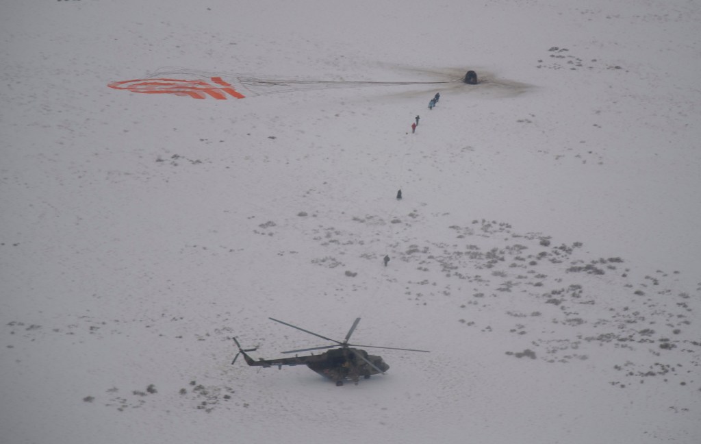 Russian Search and Rescue teams arrive at the Soyuz MS-09 spacecraft shortly after it landed with Expedition 57 crew members Serena Auñón-Chancellor of NASA, Alexander Gerst of ESA (European Space Agency), and Sergey Prokopyev of Roscosmos near the town of Zhezkazgan, Kazakhstan on Thursday, Dec. 20, 2018. Auñón-Chancellor, Gerst and Prokopyev are returning after 197 days in space where they served as members of the Expedition 56 and 57 crews onboard the International Space Station.