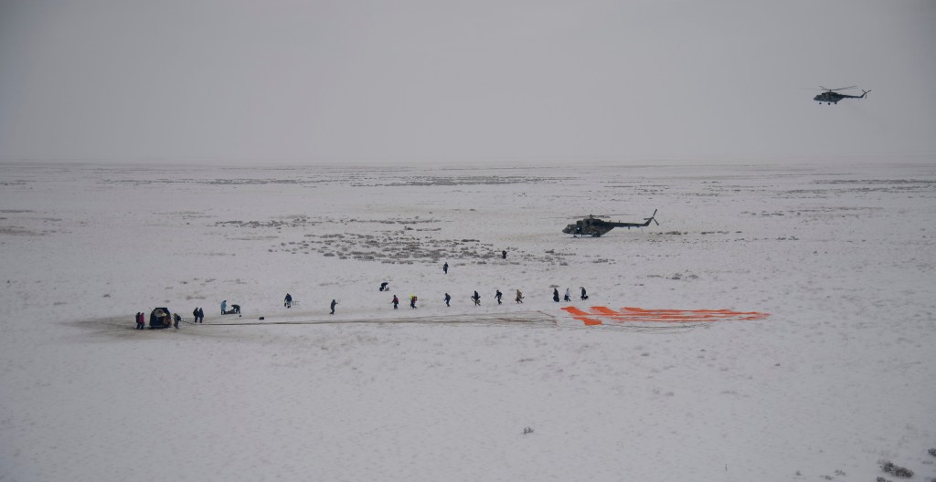 Russian Search and Rescue teams arrive at the Soyuz MS-09 spacecraft shortly after it landed with Expedition 57 crew members Serena Auñón-Chancellor of NASA, Alexander Gerst of ESA (European Space Agency), and Sergey Prokopyev of Roscosmos near the town of Zhezkazgan, Kazakhstan on Thursday, Dec. 20, 2018. Auñón-Chancellor, Gerst and Prokopyev are returning after 197 days in space where they served as members of the Expedition 56 and 57 crews onboard the International Space Station.