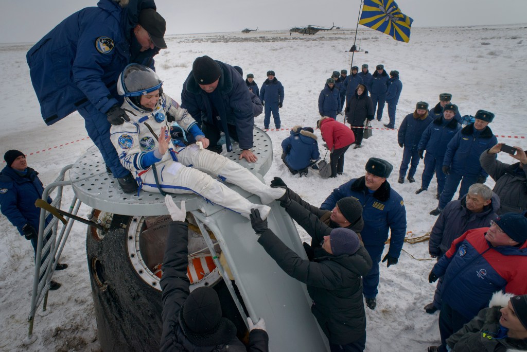 Serena Auñón-Chancellor of NASA is helped out of the Soyuz MS-09 spacecraft just minutes after she, Alexander Gerst of ESA (European Space Agency), and Sergey Prokopyev of Roscosmos, landed in a remote area near the town of Zhezkazgan, Kazakhstan on Thursday, Dec. 20, 2018. Auñón-Chancellor, Gerst and Prokopyev are returning after 197 days in space where they served as members of the Expedition 56 and 57 crews onboard the International Space Station.