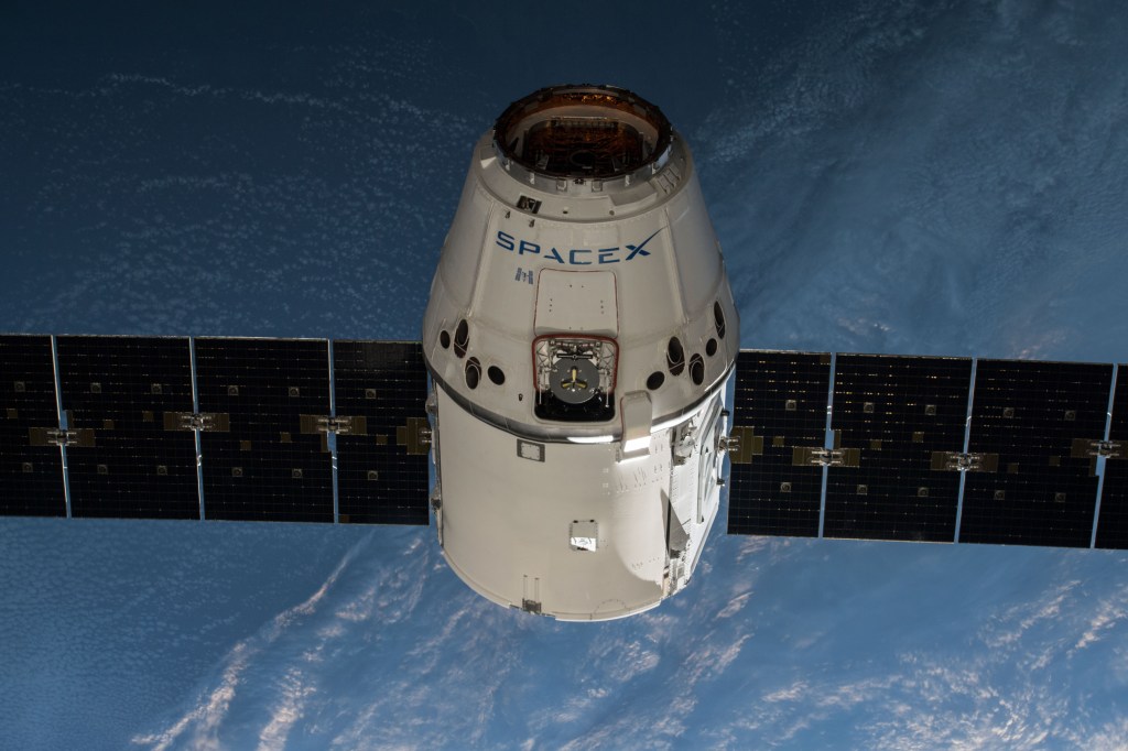 The SpaceX Dragon resupply ship slowly approaches the International Space Station as the two spacecraft orbits off the southern tip of South America.