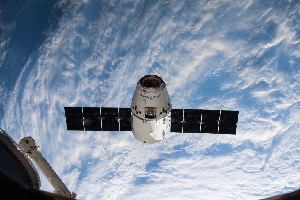 The SpaceX Dragon resupply ship nears its capture point about 10 meters away from the International Space Station. Japanese astronaut Norishige Kanai commanded the Canadian Space Agency's Canadarm2 robotic arm to grapple Dragon at 6:40 a.m. EDT over the southern part of the Democratic Republic of the Congo in Africa. NASA astronaut Scott Tingle backed up Kanai while monitoring the cargo ship's approach and rendezvous.