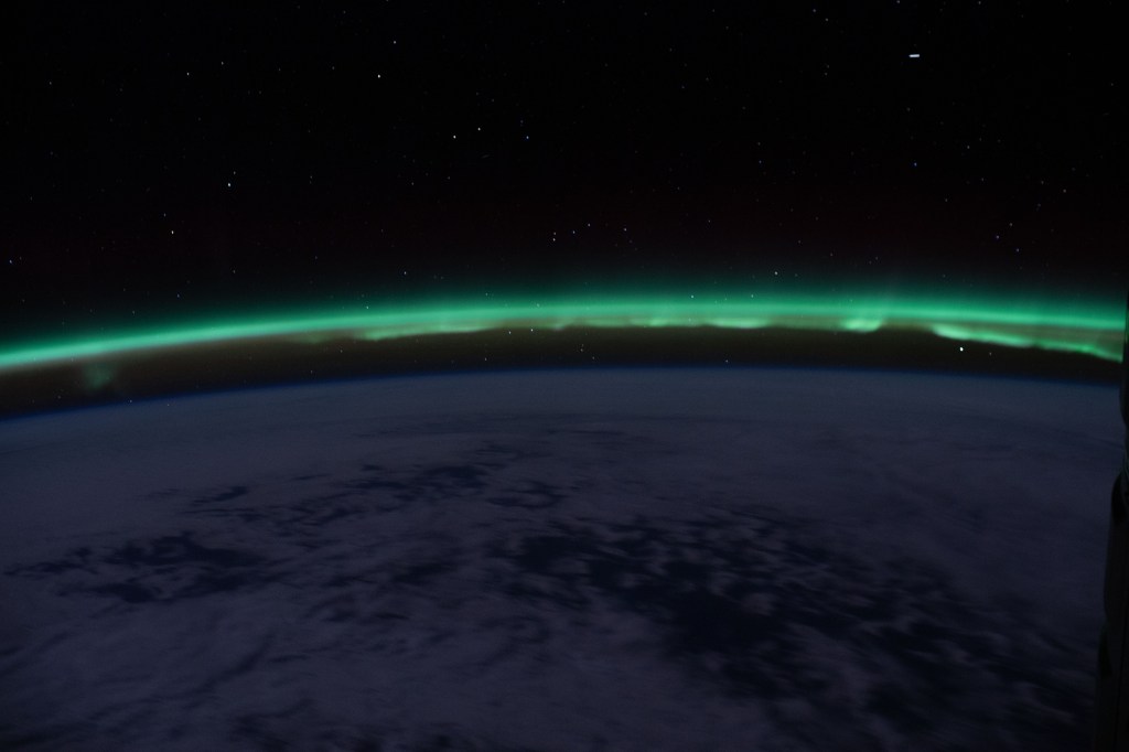 iss062e148329 (April 13, 2020) --- The "aurora australis" hovers above the Earth's horizon as the International Space Station nears the southern-most point of its orbital trek above the Indian Ocean.