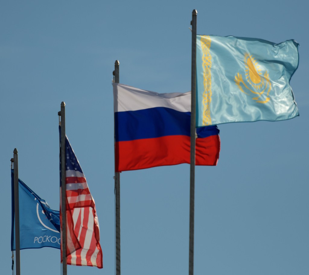 The flags of Roscosmos, the United States, Russia, and Kazakhstan are seen at the Soyuz launch pad, Tuesday, Oct. 9, 2018 at the Baikonur Cosmodrome in Kazakhstan. Expedition 57 crewmembers Nick Hague of NASA and Alexey Ovchinin of Roscosmos are scheduled to launch on October 11 and will spend the next six months living and working aboard the International Space Station.