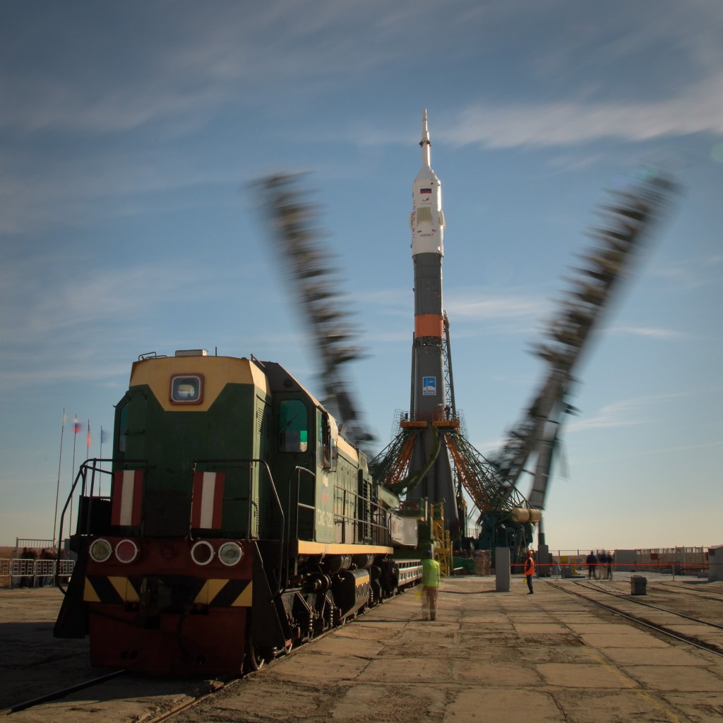 The gantry arms are seen closing around the Soyuz rocket in this long exposure photograph, Tuesday, Oct. 9, 2018 at the Baikonur Cosmodrome in Kazakhstan. Expedition 57 crewmembers Nick Hague of NASA and Alexey Ovchinin of Roscosmos are scheduled to launch on October 11 and will spend the next six months living and working aboard the International Space Station.