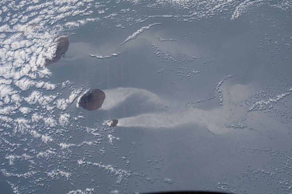 A trio of islands that are part of the volcanic ten-island nation of Cape Verde is pictured off the northwestern coast of Africa as the International Space Station orbited over the Atlantic Ocean.