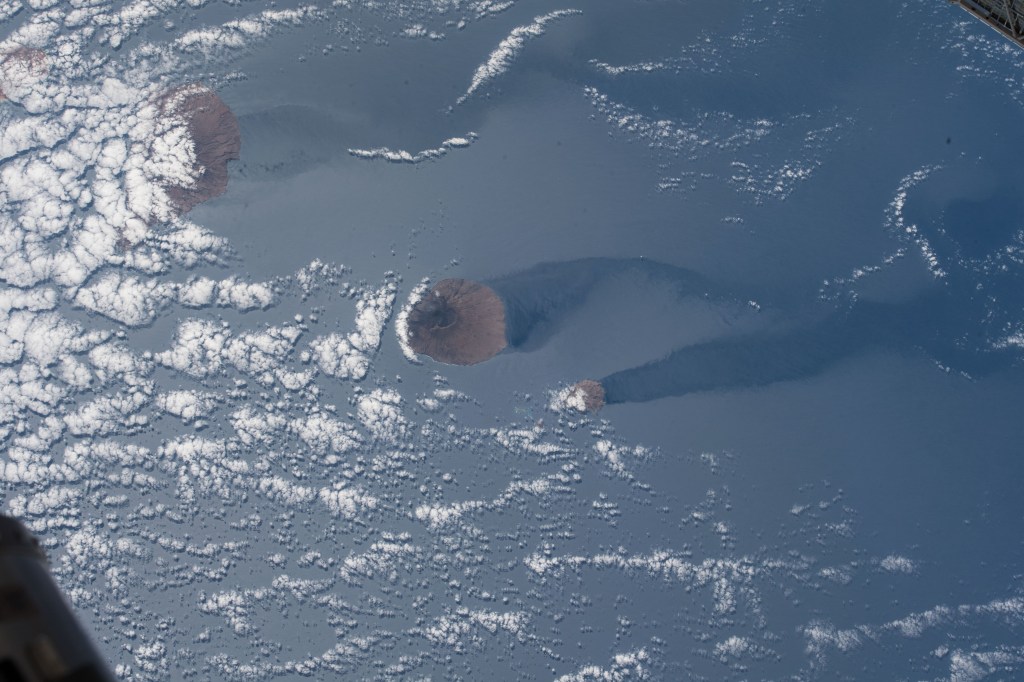 Another view of a trio of islands that are part of the volcanic ten-island nation of Cape Verde is pictured off the northwestern coast of Africa as the International Space Station orbited over the Atlantic Ocean.