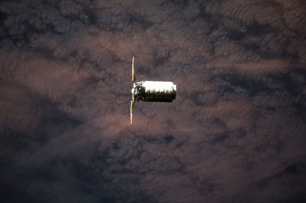 The Orbital ATK space freighter is pictured as it slowly and methodically approaches the International Space Station to resupply the Expedition 55 crew.