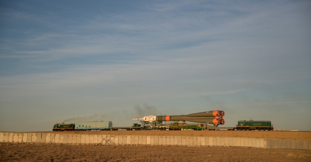 The Soyuz rocket is rolled out by train to the launch pad, Tuesday, Oct. 9, 2018 at the Baikonur Cosmodrome in Kazakhstan. Expedition 57 crewmembers Nick Hague of NASA and Alexey Ovchinin of Roscosmos are scheduled to launch on October 11 and will spend the next six months living and working aboard the International Space Station.