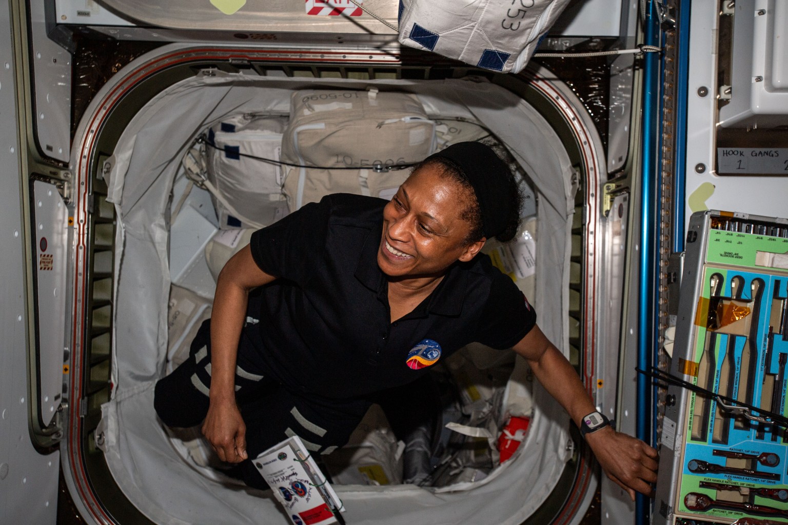 NASA astronaut and Expedition 70 Flight Engineer Jeanette Epps is pictured floating in microgravity aboard the International Space Station.