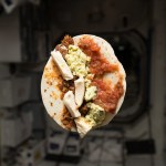 Tim Kopra photographed his breakfast floating inside of the Unity module aboard the International Space Station.