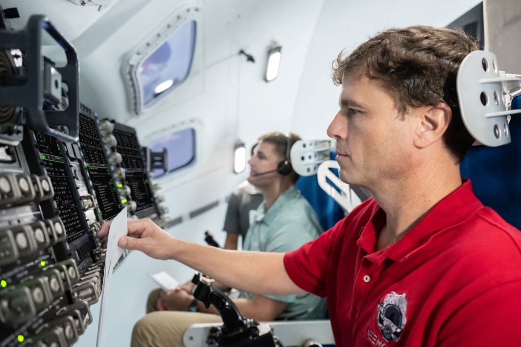  Artemis II commander Reid Wiseman and mission specialist Jeremy Hansen practice Audio Operations training in the Orion simulator at NASA’s Johnson Space Center in Houston, Texas. Credit: NASA/James Blair 