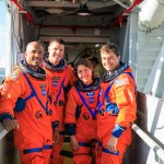 Artemis II astronauts, from left, NASA astronaut Victor Glover (left), CSA (Canadian Space Agency) astronaut Jeremy Hansen, NASA astronauts Christina Koch and Reid Wiseman stand on the crew access arm of the mobile launcher at Launch Pad 39B as part of an integrated ground systems test at Kennedy Space Center in Florida on Wednesday, Sept. 20. The test ensures the ground systems team is ready to support the crew timeline on launch day.