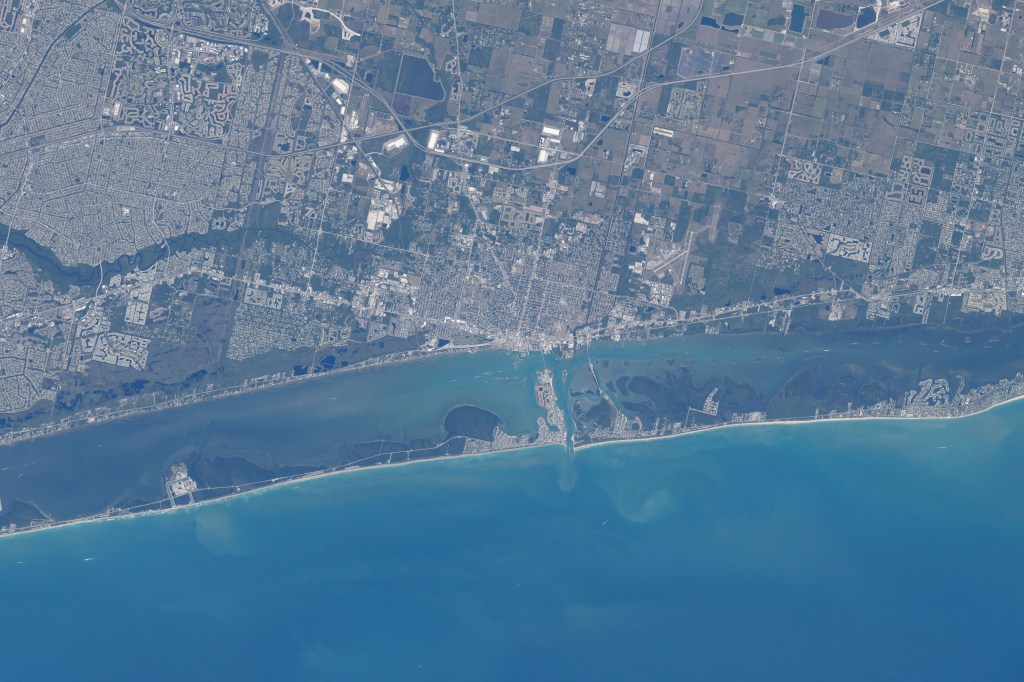 Fort Pierce, Florida, and its surrounding suburbs are pictured from the International Space Station as it orbited 258 miles above The Sunshine State's Atlantic coast.