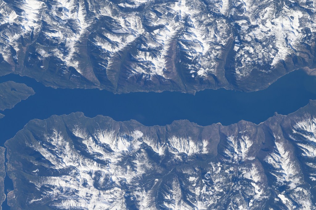 The southern portion of Kootenay Lake, sourrounded by the Canadian Rockies, in the Canadian province of British Columbia is pictured from the International Space Station as it orbited 260 miles above North America.