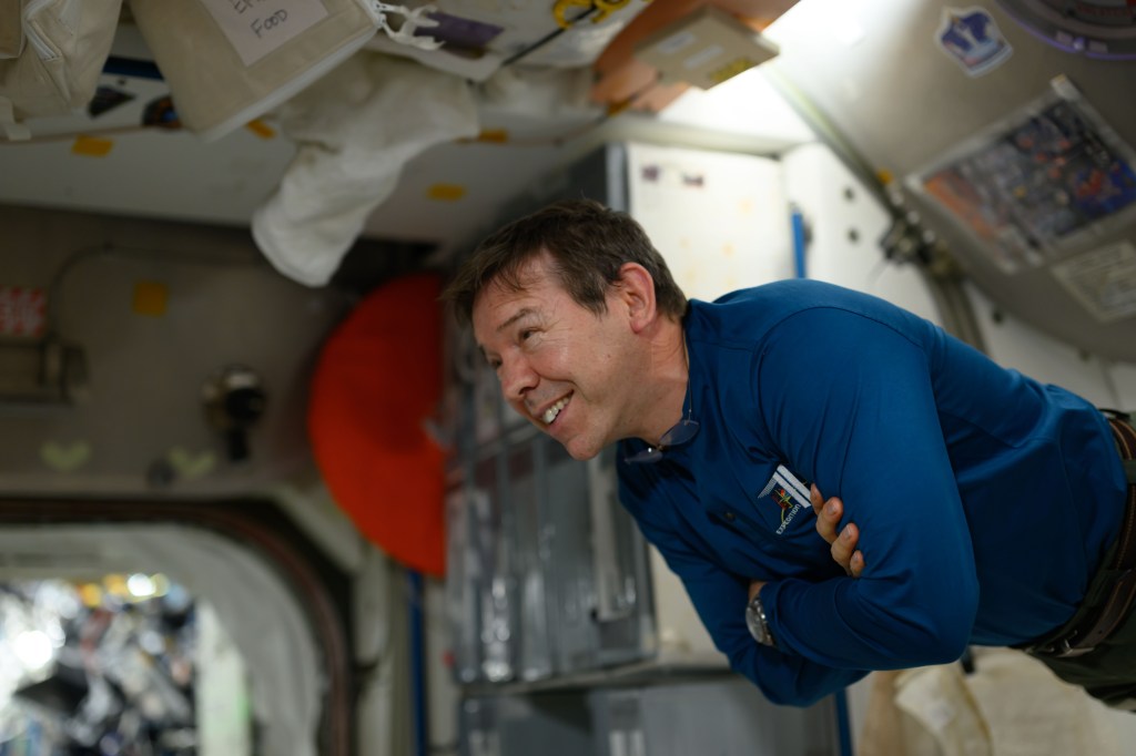 Expedition 71 Flight Engineer and NASA astronaut MIke Barratt is pictured relaxing aboard the International Space Station's Unity module.