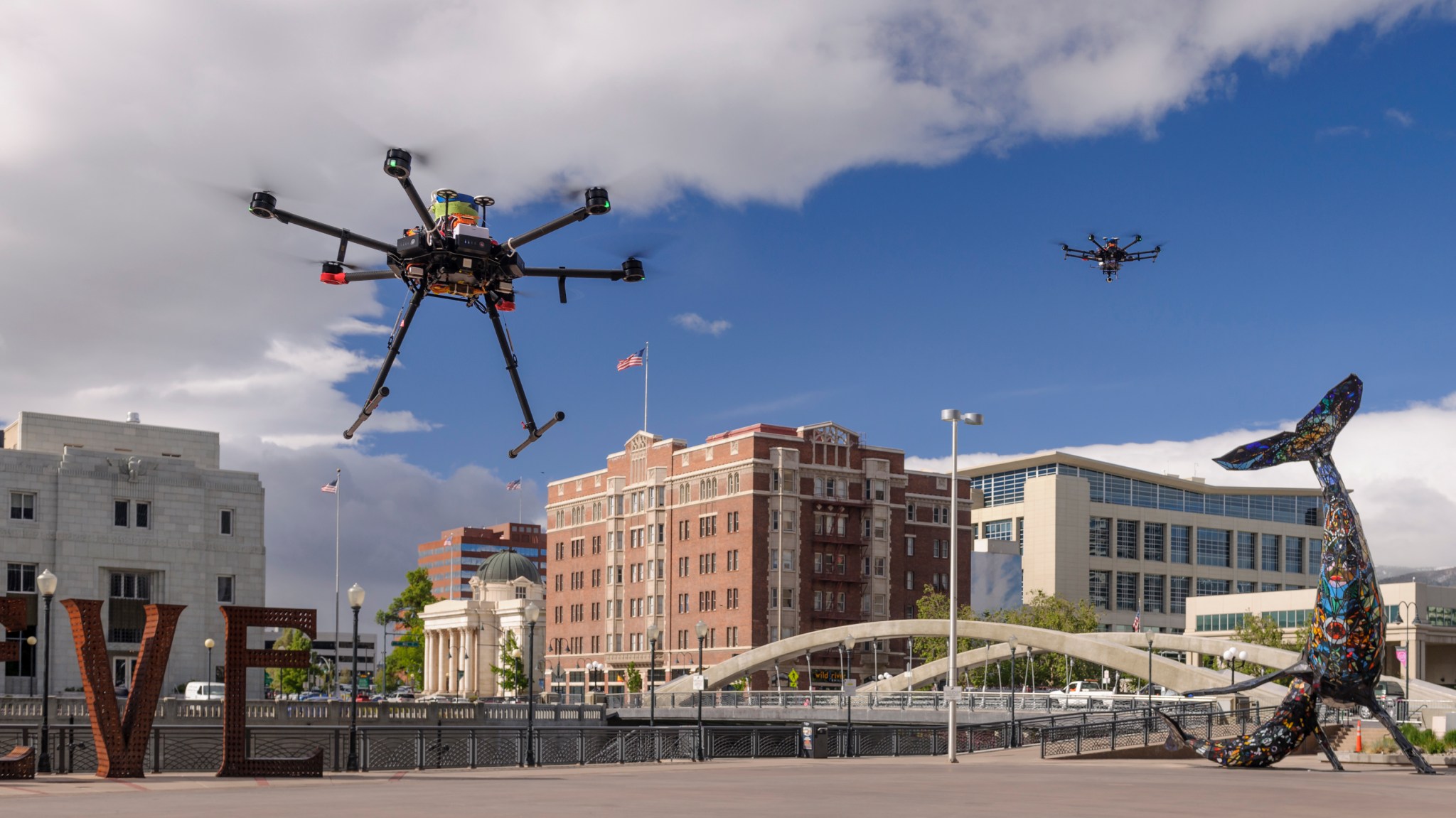 Drones in flight in downtown Reno, Nevada