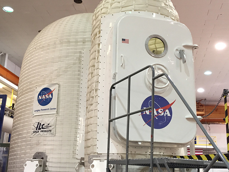 A demonstration at NASA Langley Research Center's Structures and Materials Laboratory of a future otherworldly home for astronauts.