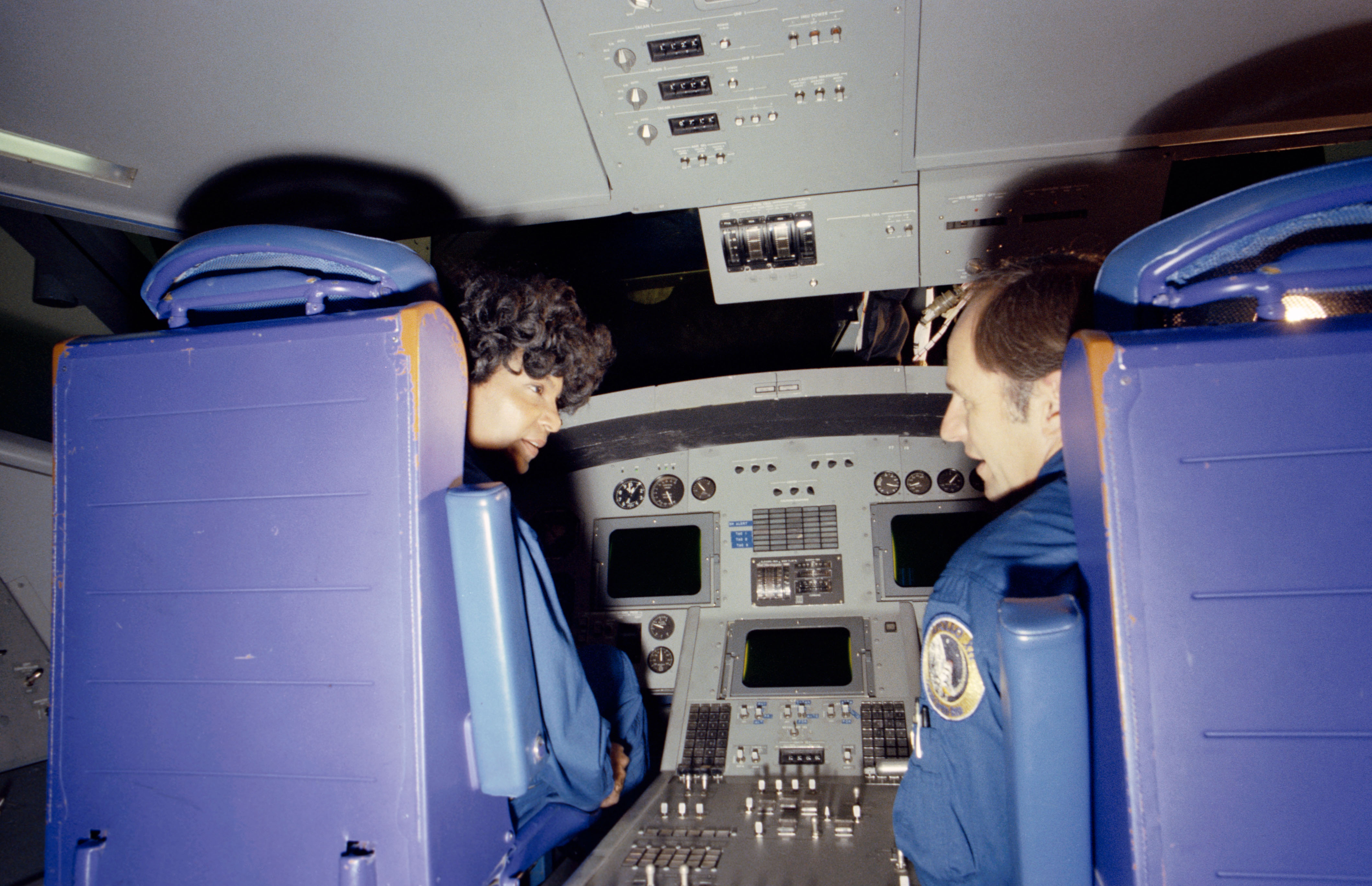 Star Trek cast member Nichelle Nichols, left, in the shuttle simulator with astronaut Alan L. Bean at NASA’s Johnson Space Center (JSC) in Houston
