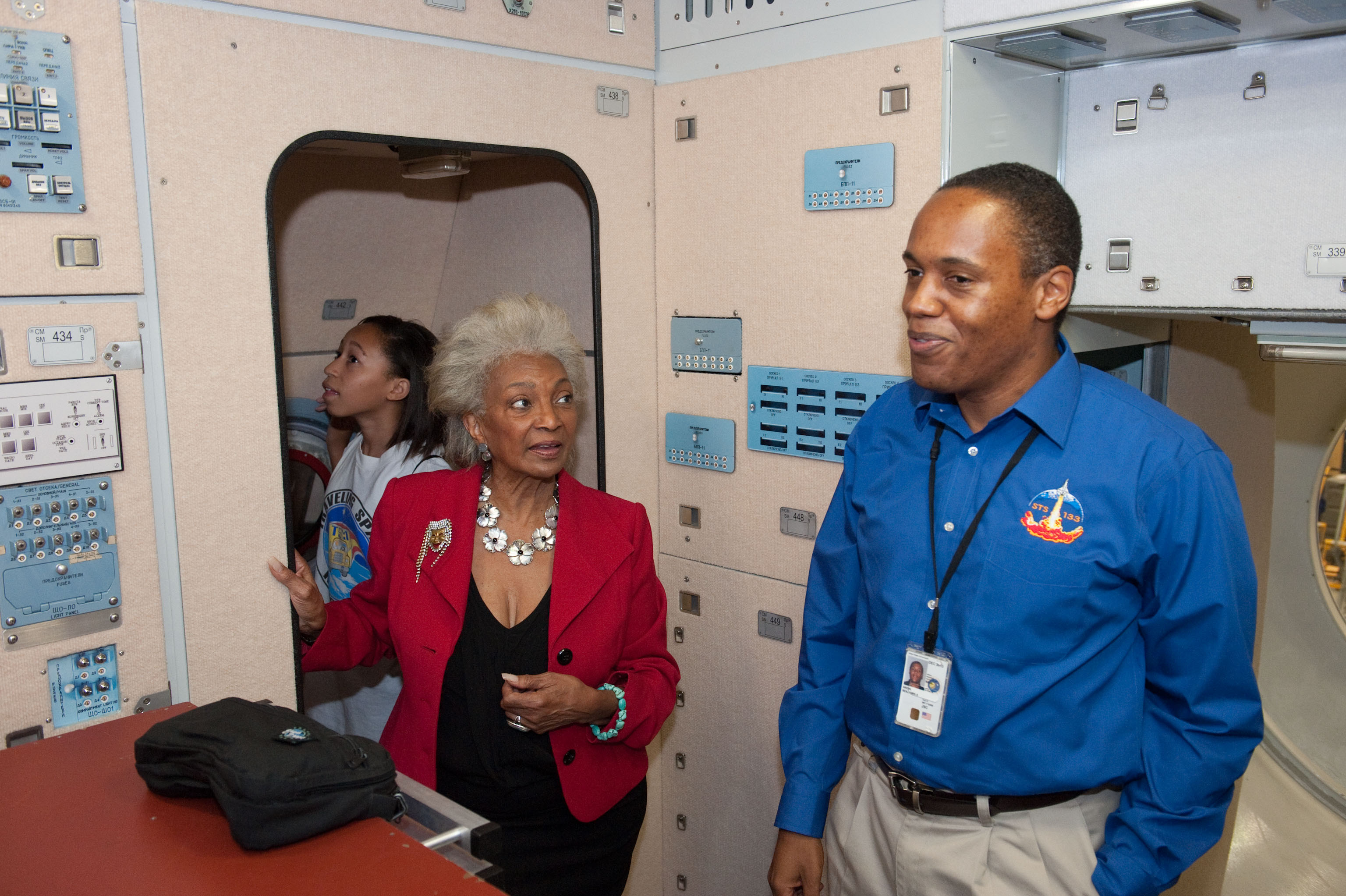 Nichols, center, aboard NASA's Stratospheric Observatory for Infrared Astronomy aircraft