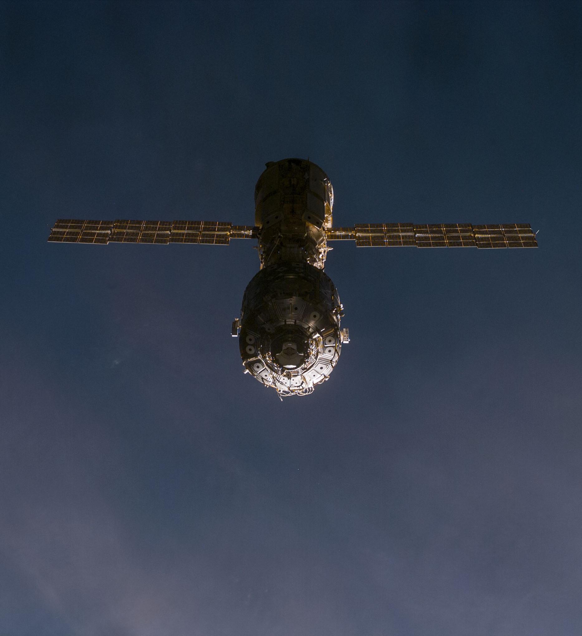 View of the International Space Station from Discovery during the rendezvous maneuver.